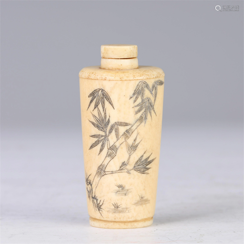 A CHINESE BONE SNUFF BOTTLE WITH ENGRAVED BAMBOOS