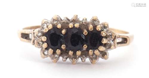 9ct gold, sapphire and diamond cluster ring centring three o...