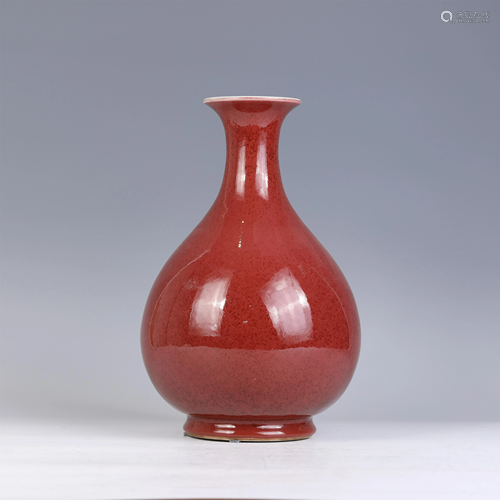 A CHINESE RED GLAZED PORCELAIN VASE