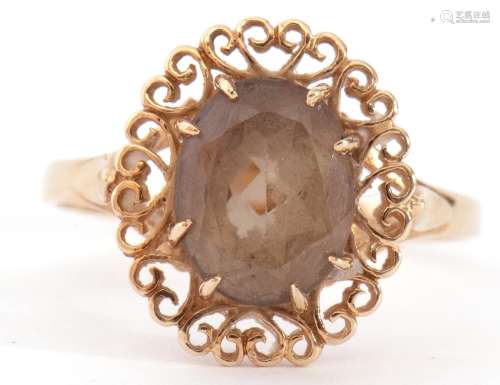 9ct gold smoky quartz ring, the oval shaped faceted quartz,1...