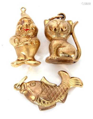 Three yellow metal charms, a gnome, fish and a cat, g/w 8gms