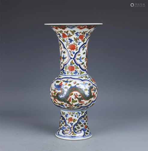 A CHINESE BLUE AND WHITE WU-CAI DRAGON PHOENIX VASE