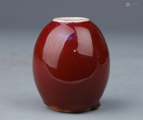 A CHINESE RED GLAZED PORCELAIN JAR