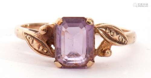 9ct gold and amethyst ring centring a step cut pale amethyst...