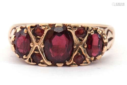 9ct gold and garnet ring featuring three oval graduated garn...