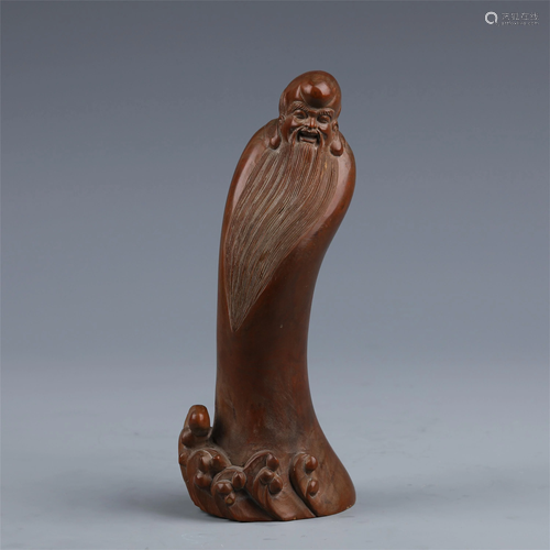 A CHINESE HARDWOOD CARVED STATUETTE OF LONGEVITY …