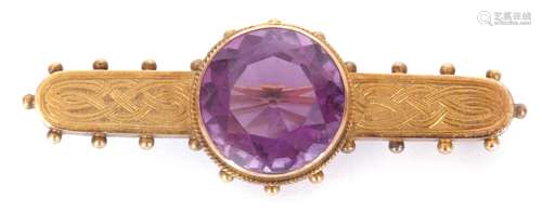 Antique Etruscan amethyst brooch centring a round faceted am...