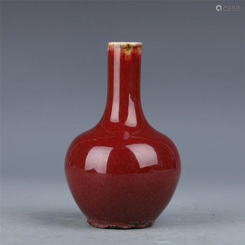 A CHINESE RED GLAZED PORCELAIN GLOBULAR VASE