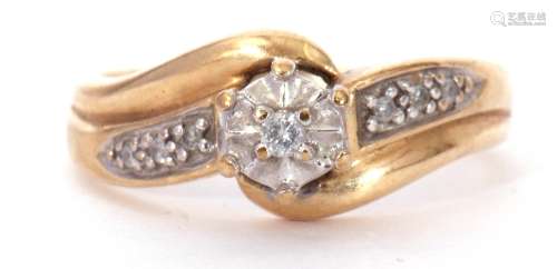 Modern 9K stamped diamond cross-over ring centring a small d...