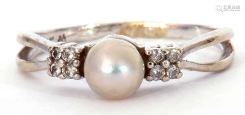 Modern 14K stamped cultured pearl and diamond ring, the cult...