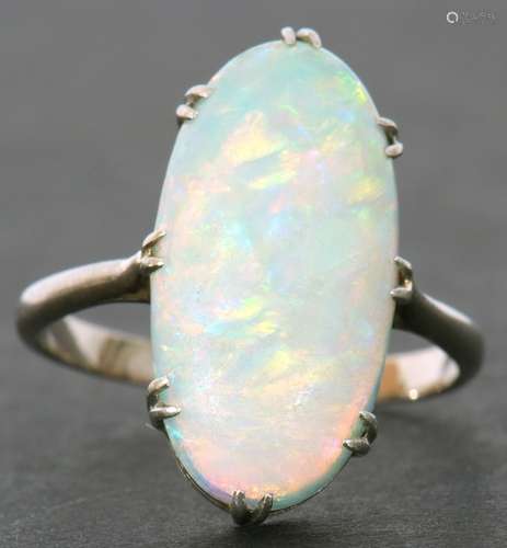 Large opalescent dress ring of oval cabochon shape, 18 x 10m...