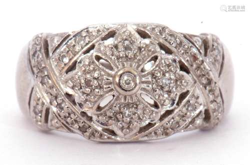 9ct white gold and diamond cluster ring, the openwork floral...