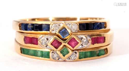 Three modern stacking rings, sapphire, ruby and emerald set,...