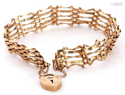 Modern 9ct gold gate bracelet, five bar design with heart pa...