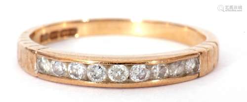 9ct gold diamond half hoop ring featuring nine round channel...