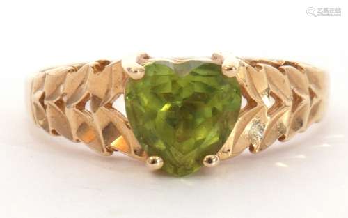 Modern 585 stamped peridot set ring, the heart shaped perido...