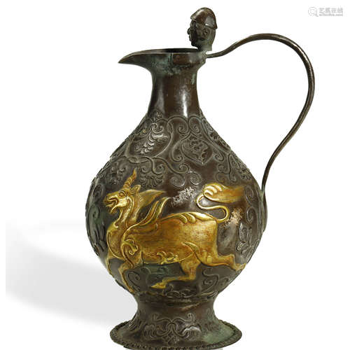 TANG DYNASTY,A FINE PARCEL-GILT SILVER EWER