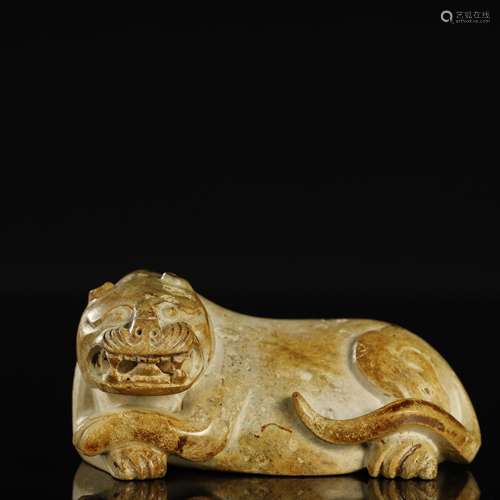 A FINE JADE MYTHICAL BEAST ORNAMENT,WARRING STATES PERIOD OF...