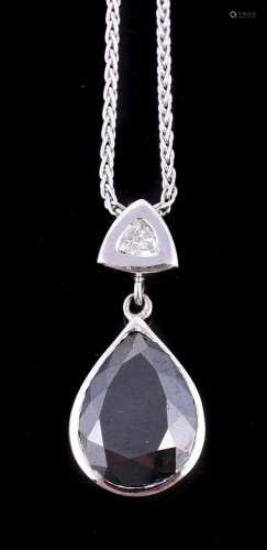 A black diamond and diamond pendant
