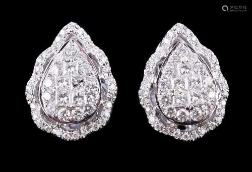 A pair of diamond cluster earrings