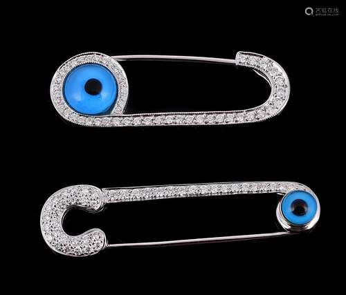 Two diamond set Eye safety pin brooches