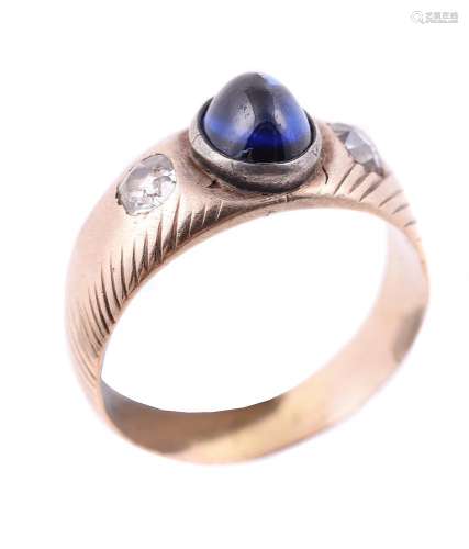 A sapphire and diamond three stone ring