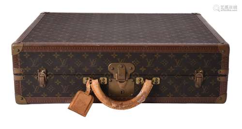 Louis Vuitton, a Monogrammed coated canvas and leather suitc...