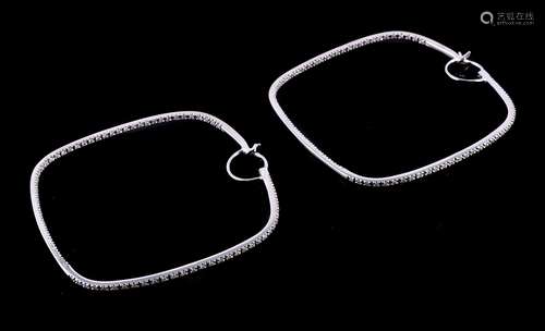 A pair of diamond ear hoops