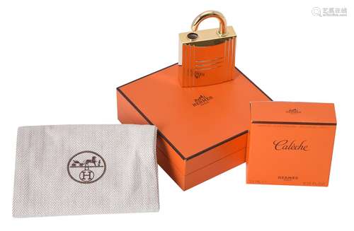 Hermes, a gilt metal padlock perfume holder