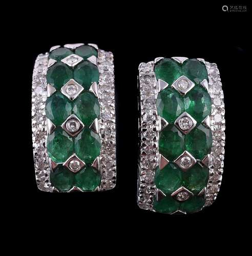 A pair of emerald and diamond earrings