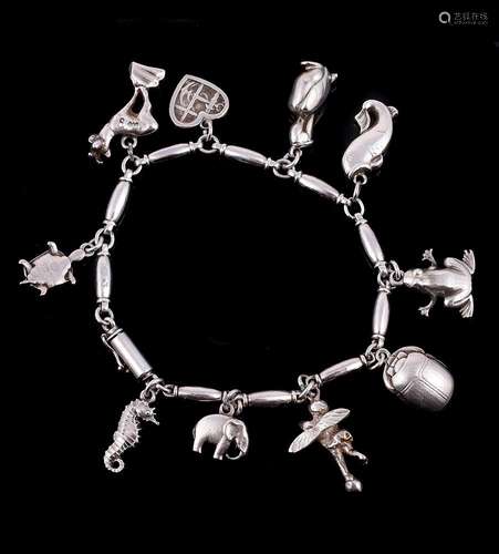 A silver coloured charm bracelet by Henry Pilstrup for Georg...