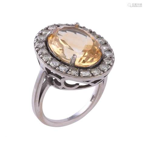 A diamond and citrine cluster dress ring