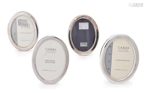 Three silver mounted oval photo frames by Carr's of Sheffiel...