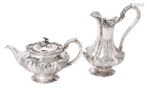 Y A Victorian silver lobed circular tea pot and hot water po...