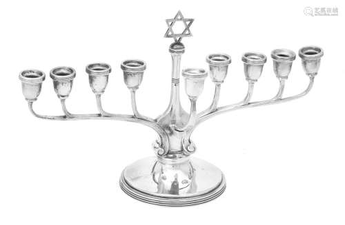 A silver nine branch Menorah by Adie Bros. Ltd.