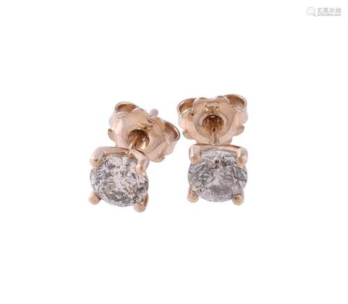 A pair of diamond ear studs