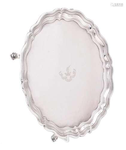 An Edwardian silver shaped circular salver by James Dixon & ...