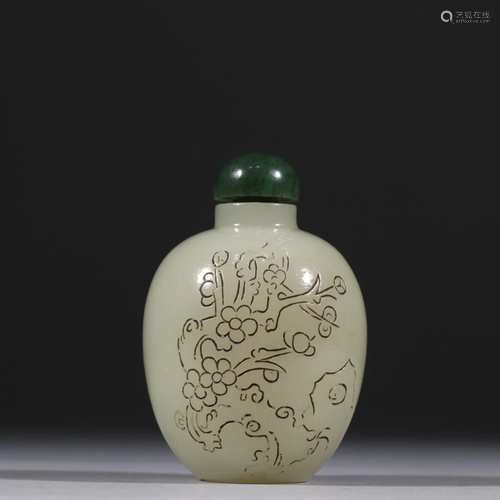 A CREAMY JADE CARVING 'PLUM BLOSSOM' SNUFF BOTTLE