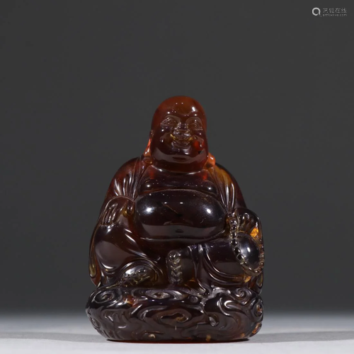 AN AMBER CARVING FIGURINE OF MAITREYA