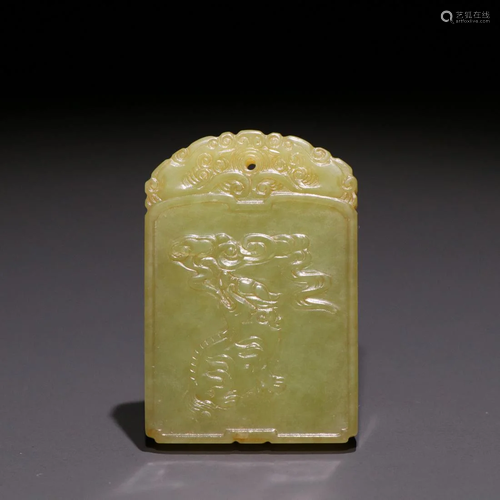 AN ENGRAVED YELLOW JADE CARVING PLAQUE