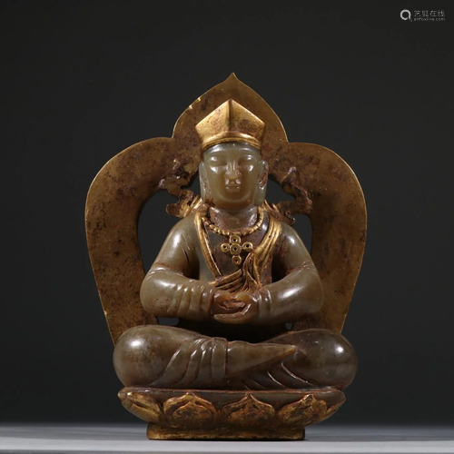 A JADE CARVING BUDDHA WITH GILT BRONZE AUREOLE