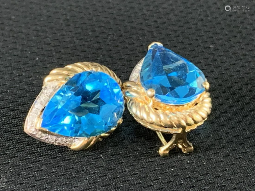 14 K Gold And Pear Shaped Blue Topaz Earrings