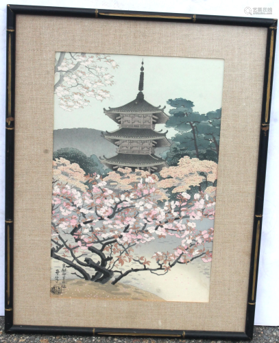 Japanese woodblock print of pagoda w cherry tree in