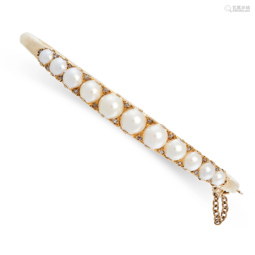 A PEARL AND DIAMOND BANGLE in yellow gold, set with a