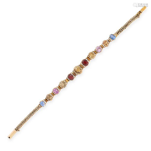 A VINTAGE GEMSET BRACELET in yellow gold, set with a