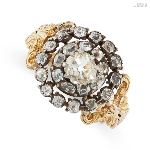 AN ANTIQUE DIAMOND RING in 18ct yellow gold and silver,