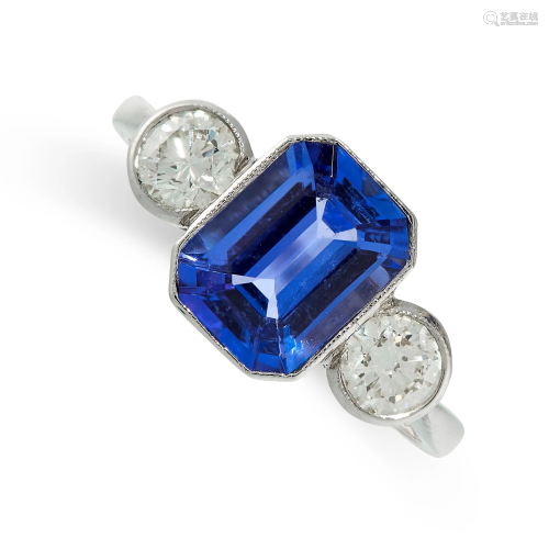 A TANZANITE AND DIAMOND RING in platinum, set with an
