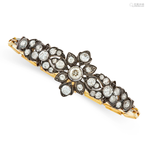 A DIAMOND BRACELET in yellow gold and silver, formed of