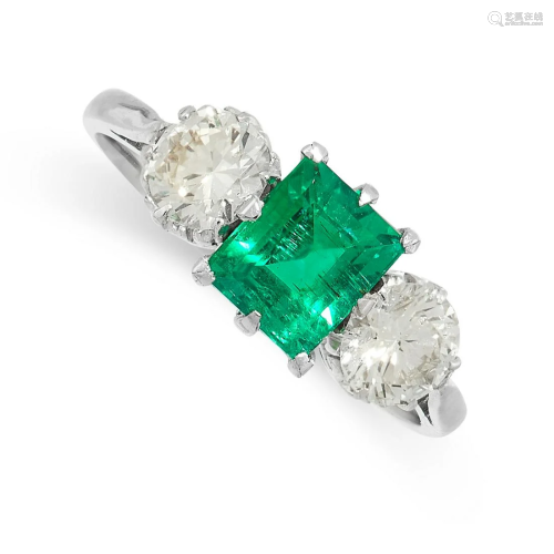 AN EMERALD AND DIAMOND DRESS RING set with a