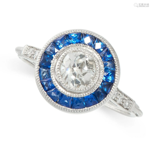 A DIAMOND AND SAPPHIRE DRESS RING of target design, set